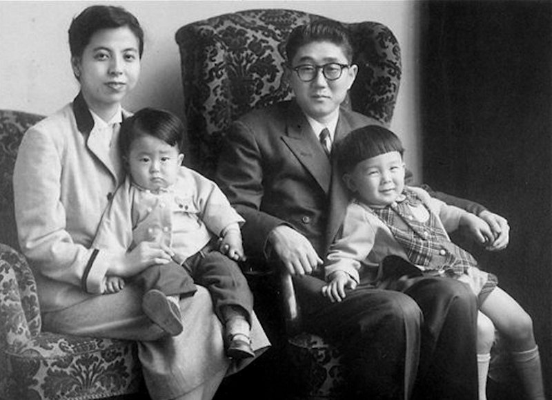 Japanese Prime Minister Shinzo Abe as a child, left, with his family in 1956. His father, Shintaro Abe, was foreign minister between 1982 and 1986.